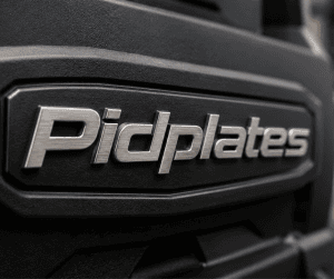 Industrial product with custom 3D emblem enhancing perceived quality and premium branding